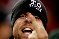EAST RUtheRFORD, NJ - OCTOBER 18:  A  New York Jets fan reacts to the 16-13 overtime defeat against the Buffalo Bills on October 18, 2009 at Giants Stadium in East Rutherford, New Jersey.  (Photo by Al Bello/Getty Images)