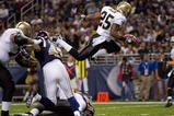 ST. LOUIS - NOVEMBER 15: Reggie Bush #25 of the New Orleans Saints scores a touchdown against the St. Louis Rams at the Edward Jones Dome on November 15, 2009 in St. Louis, Missouri.  (Photo by Dilip Vishwanat/Getty Images)