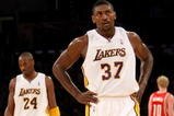 LOS ANGELES - NOVEMBER 15:  Ron Artest #37 and Kobe Bryant #24 ofthe Los Angeles Lakers stand on the court in the game with the Houston Rockets on November 15, 2009 at Staples Center in Los Angeles, California. The Rockets won 101-91.  NOTE TO USER: User expressly acknowledges and agrees that, by downloading and/or using this Photograph, user is consenting to the terms and conditions of the Getty Images License Agreement.   (Photo by Stephen Dunn/Getty Images)