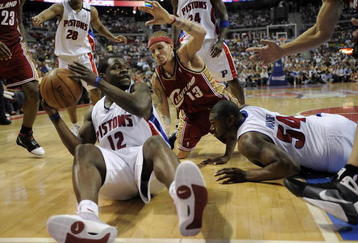 AUBURN HILLS, MI - APRIL 26: Will Bynum #12 of the Detroit Pistons tries to pass to a teammate but his foot was out of bounds in front of Delonte West #13 of the Cleveland Cavaliers in Game Four of the Eastern Conference Quarterfinals during the 2009 NBA Playoffs at the Palace of Auburn Hills on April 26, 2009 in Auburn Hills, Michigan. NOTE TO USER: User expressly acknowledges and agrees that, by downloading and or using this photograph, User is consenting to the terms and conditions of the Getty Images License Agreement.  (Photo by Gregory Shamus/Getty Images)