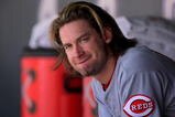 DENVER - SEPTEMBER 07:  Bronson Arroyo #61 of the Cincinnati Reds looks on from the dugout against the Colorado Rockies at Coors Field on September 7, 2009 in Denver, Colorado. The Rockies defeated the Reds 4-3.  (Photo by Doug Pensinger/Getty Images)