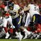 CINCINNATI - NOVEMBER 13:  Ryan Clarke #32 of the West Virginia Mountaineers rushes for a 37 yard touchdown in the second quarter of the game against the Cincinnati Bearcats in at Nippert Stadium on November 13, 2009 in Cincinnati, Ohio.  (Photo by Andy Lyons/Getty Images)