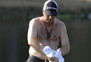 UNITED STATES - OCTOBER 26:  Doug Barron dries off after playing from a water hazard on the 16th hole during the first round of the 2006 Chrysler Championship Oct. 26 in Palm Harbor, Fl.  (Photo by Al Messerschmidt/Getty Images)
