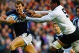 EDINBURGH, SCOTLAND - NOVEMBER 14:  Rory Lamont of Scotland is tackled by Iferemeimi Rawaqa of Fiji during the Bank of Scotland Corporate Autumn Tests at Murrayfield Stadium on November 14, 2009 in Edinburgh, Scotland.  (Photo by Jeff J Mitchell/Getty Images)