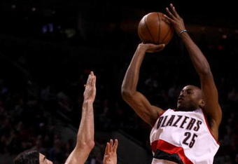 PORTLAND, OR - APRIL 28:  Travis Outlaw #25 of the Portland Trail Blazers shoots against Luis Scola #4 of the Houston Rockets during Game 5 of the Western Conference Quarterfinals of the NBA Playoffs on April 28, 2009 at the Rose Garden in Portland, Oregon. NOTE TO USER: User expressly acknowledges and agrees that, by downloading and or using this Photograph, user is consenting to the terms and conditions of the Getty Images License Agreement.  (Photo by Jonathan Ferrey/Getty Images)