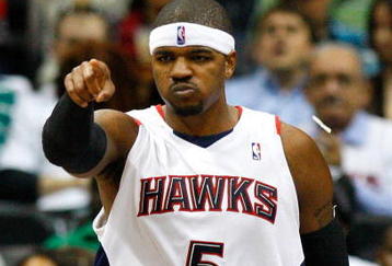 ATLANTA - OCTOBER 28:  Josh Smith #5 of the Atlanta Hawks reacts after an assist during the game against the Indiana Pacers at Philips Arena on October 28, 2009 in Atlanta, Georgia.  (Photo by Kevin C. Cox/Getty Images)