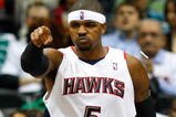 ATLANTA - OCTOBER 28:  Josh Smith #5 of the Atlanta Hawks reacts after an assist during the game against the Indiana Pacers at Philips Arena on October 28, 2009 in Atlanta, Georgia.  (Photo by Kevin C. Cox/Getty Images)