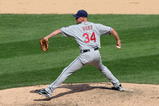 CHICAGO - AUGUST 09: Kerry Wood #34 of the Cleveland Indians delivers the pitch during the game against the Chicago White Sox on August 9, 2009 at U.S. Cellular Field in Chicago, Illinois. (Photo by Jonathan Daniel/Getty Images) 