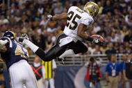 ST. LOUIS - NOVEMBER 15: Reggie Bush #25 of the New Orleans Saints scores a touchdown against the St. Louis Rams at the Edward Jones Dome on November 15, 2009 in St. Louis, Missouri.  (Photo by Dilip Vishwanat/Getty Images)