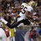 ST. LOUIS - NOVEMBER 15: Reggie Bush #25 of the New Orleans Saints scores a touchdown against the St. Louis Rams at the Edward Jones Dome on November 15, 2009 in St. Louis, Missouri.  (Photo by Dilip Vishwanat/Getty Images)
