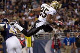 ST. LOUIS - NOVEMBER 15: Reggie Bush #25 of the New Orleans Saints scores a touchdown against the St. Louis Rams at the Edward Jones Dome on November 15, 2009 in St. Louis, Missouri.  (Photo by Dilip Vishwanat/Getty Images)