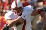 LOS ANGELES, CA - NOVEMBER 14:  Running back Toby Gerharrt #7 of the Stanford Cardinal  carries the ball against the USC Trojans on November 14, 2009 at the Los Angeles Coliseum in Los Angeles, California.  Stanford won 55-21.  (Photo by Stephen Dunn/Getty Images)