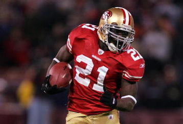 SAN FRANCISCO - NOVEMBER 12:  Frank Gore #21 of the San Francisco 49ers runs with the ball during their game against the Chicago Bears at Candlestick Park on November 12, 2009 in San Francisco, California.  (Photo by Ezra Shaw/Getty Images)