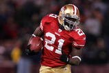 SAN FRANCISCO - NOVEMBER 12:  Frank Gore #21 of the San Francisco 49ers runs with the ball during their game against the Chicago Bears at Candlestick Park on November 12, 2009 in San Francisco, California.  (Photo by Ezra Shaw/Getty Images)