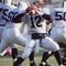 PENN STATE QUARTERBACK KERRY COLLINS LOOKS TO PASS.