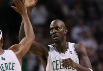 BOSTON - NOVEMBER 01:  Kevin Garnett #5 and Paul Pierce #34 of the Boston Celtics celebrate the win over the New Orleans Hornets at the TD Garden on November 1, 2009 in Boston, Massachusetts. The Celtics defeated the Hornets 97-87. NOTE TO USER: User expressly acknowledges and agrees that, by downloading and or using this photograph, User is consenting to the terms and conditions of the Getty Images License Agreement.  (Photo by Elsa/Getty Images)