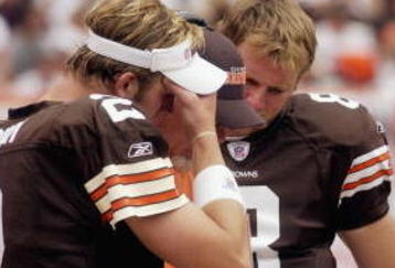 CLEVELAND - SEPTEMBER 28:  Offensive coordinator Bruce Arians of the Cleveland Browns talks to quarterbacks Tim Couch #2, Nate Hybl #8, and Kelly Holcomb #10 during a game against the Cincinnati Bengals at Cleveland Browns Stadium on September 28, 2003 in Cleveland, Ohio. The Bengals defeated the Browns 21-14.  (Photo by Phil Long/Getty Images)