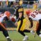 PITTSBURGH - NOVEMBER 15:  Ben Roethlisberger #7 of the Pittsburgh Steelers is pressured by Frostee Rucker #92 and Michael Johnson #93 of the Cincinnati Bengals at Heinz Field on November 15, 2009 in Pittsburgh, Pennsylvania. The Bengals won 18-12. (Photo by Rick Stewart/Getty Images)