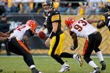 PITTSBURGH - NOVEMBER 15:  Ben Roethlisberger #7 of the Pittsburgh Steelers is pressured by Frostee Rucker #92 and Michael Johnson #93 of the Cincinnati Bengals at Heinz Field on November 15, 2009 in Pittsburgh, Pennsylvania. The Bengals won 18-12. (Photo by Rick Stewart/Getty Images)