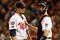 MINNEAPOLIS, MN - OCTOBER 11: Pitcher Carl Pavano #48 of the Minnesota Twins talks with catcher Joe Mauer #2 after Jorge Posada  the New York Yankees hit a home run in the seventh inning to take a 2-1 lead in Game Three of the ALDS during the 2009 MLB Playoffs at the Hubert H. Humphrey Metrodome on October 11, 2009 in Minneapolis, Minnesota. (Photo by Genevieve Ross/Getty Images)