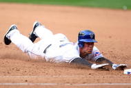 NEW YORK - APRIL 04:  Josh Thole #78 of the New York Mets dives back to first against the Boston Red Sox on April 4, 2009 at Citi Field in the Flushing neighborhood of the Queens borough of New York City. The Red Sox defeated the Mets 9-3.  (Photo by Jim McIsaac/Getty Images)