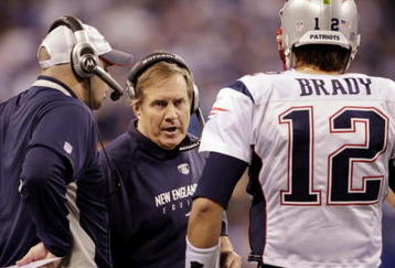 INDIANAPOLIS - NOVEMBER 15: Quarterback Tom Brady #12 of the New England Patriots speaks to head coach Bill Belichick in the fourth quarter of the game against the Indianapolis Colts at Lucas Oil Stadium on November 15, 2009 in Indianapolis, Indiana. The Colts won the game 35-34. (Photo by Andy Lyons/Getty Images)