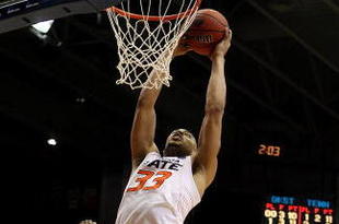 DAYTON, OH - MARCH 20: Marshall Moses #33 of the Oklahoma State Cowboys dunks the ball against the Tennessee Volunteers during the first round of the NCAA Division I Men's Basketball Tournament at the University of Dayton Arena on March 20, 2009 in Dayton, Ohio.  (Photo by Andy Lyons/Getty Images)