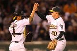 OAKLAND, CA - AUGUST 17:  Kurt Suzuki #8 high fives teammate Andrew Bailey #40 of the Oakland Athletics after closing out the ninth inning against the New York Yankees during the Major League Baseball game at the Oakland Coliseum on August 17, 2009 in Oakland, California. The A's won 3-0.  (Photo by Jed Jacobsohn/Getty Images)
