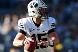 SAN DIEGO - OCTOBER 17: Max Hall #15 of BYU Cougars looks to pass the ball to teamate while playing against San Diego State Aztecs at Qualcomm Stadium on October 17, 2009 in San Diego, California.  (Photo by Jacob de Golish/Getty Images)