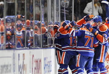 EDMONTON, AB - OCTOBER 3:  Gilbert Brule celebrates his goal with teammates (L-R) Andrew Cogliano, Lubomir Visnovsky, Ladislav Smid and Dustin Penner against the Calgary Flames in the second period during an NHL game on October 3, 2009 at Rexall Arena in Edmonton, Canada. L(Photo by Jimmy Jeong/Getty Images)