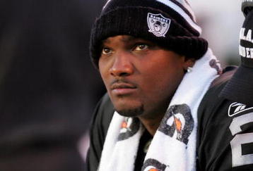 OAKLAND, CA - NOVEMBER 15:  JaMarcus Russell #2 of the Oakland Raiders sits on the bench after being taken out of their game against the Kansas City Chiefs at Oakland-Alameda County Coliseum on November 15, 2009 in Oakland, California.  (Photo by Ezra Shaw/Getty Images)