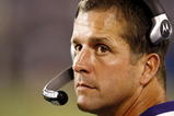 CHARLOTTE, NC - AUGUST 29: John Harbaugh, head coach of the Baltimore Ravens looks on from the sidelines during their preseason game against the Carolina Panthers at Bank of America Stadium on August 29, 2009 in Charlotte, North Carolina. (Photo by Streeter Lecka/Getty Images)