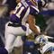 MINNEAPOLIS - NOVEMBER 15: Visanthe Shiancoe #81 of the Minnesota Vikings avoids Phillip Buchanon #31 of the Detroit Lions on November 15, 2009 at Hubert H. Humphrey Metrodome in Minneapolis, Minnesota. The Vikings defeated the Lions 27-10.  (Photo by Elsa/Getty Images)