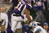 MINNEAPOLIS - NOVEMBER 15: Visanthe Shiancoe #81 of the Minnesota Vikings avoids Phillip Buchanon #31 of the Detroit Lions on November 15, 2009 at Hubert H. Humphrey Metrodome in Minneapolis, Minnesota. The Vikings defeated the Lions 27-10.  (Photo by Elsa/Getty Images)