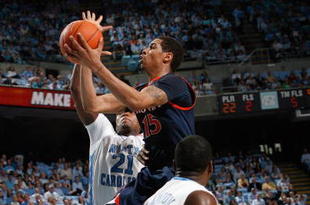 CHAPEL HILL, NC - FEBRUARY 07:  Sylven Landesberg #15 of the Virginia Cavaliers goes to the basket against Deon Thompson #21 of the North Carolina Tar Heels on February 7, 2009 at the Dean E. Smith Center in Chapel Hill, North Carolina.  (Photo by Kevin C. Cox/Getty Images)
