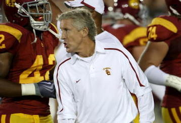 LOS ANGELES, CA - SEPTEMBER 26:  Head coach Pete Carroll of the USC Trojans works during warmups for the game with the Washington State Cougars on September 23, 2009 at the Los Angeles Coliseum in Los Angeles, California.  USC won 27-6.  (Photo by Stephen Dunn/Getty Images)