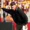 LOS ANGELES, CA - NOVEMBER 14:  Head coach Jim Harbaugh of the Stanford Cardinal signals during the game with the USC Trojans on November 14, 2009 at the Los Angeles Coliseum in Los Angeles, California.  Stanford won 55-21.  (Photo by Stephen Dunn/Getty Images)