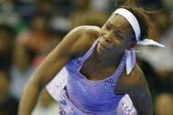 SEOUL, SOUTH KOREA - SEPTEMBER 19: Venus Williams of United States serves to Maria Sharapova of Russia during  their invitational exhibition match at the olympic gymnasium on September 19, 2005 in Seoul, South Korea. Williams won 6-4, 6-4. (Photo by Chung Sung-Jun/Getty Images)  