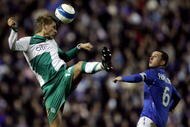 GLASGOW, UNITED KINGDOM - MARCH 06:  Aaron Hunt of Werder fights for the ball wit Barry Ferguson of Rangers during the UEFA Cup Round of 16 first leg match between Rangers FC and Werder Bremen at the Ibrox Stadium on March 6, 2008 in Glasgow, Scotland.  (Photo by Friedemann Vogel/Getty Images)
