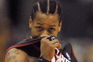 8 Jun 2001:  Allen Iverson #3 of the Philadelphia 76ers wipes his face during Game 2 of the NBA Finals against the Los Angeles Lakers at the Staples Center in Los Angeles, California.  DIGITAL IMAGE Mandatory Credit: Otto Greule/ALLSPORT  NOTE TO USER: It is expressly understood that the only rights Allsport are offering to license in this Photograph are one-time, non-exclusive editorial rights. No advertising or commercial uses of any kind may be made of Allsport photos.  User acknowledges that it is aware that Allsport is an editorial sports agency and that NO RELEASES OF ANY TYPE ARE OBTAINED from the subjects contained in the photographs.