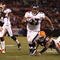 CLEVELAND - NOVEMBER 16: Ray Rice #27 of the Baltimore Ravens scores a 13-yard touchdown in the third quarter against Brodney Pool #21 and Eric Wright #24 of the Cleveland Browns at Cleveland Browns Stadium on November 16, 2009 in Cleveland, Ohio.  (Photo by Matt Sullivan/Getty Images)