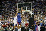 SAN ANTONIO - APRIL 07:  Mario Chalmers #15 of the Kansas Jayhawks shoots and makes a three-pointer to tie the game to send it into overtime against the Memphis Tigers during the 2008 NCAA Men's National Championship game at the Alamodome on April 7, 2008 in San Antonio, Texas.  (Photo by Streeter Lecka/Getty Images)