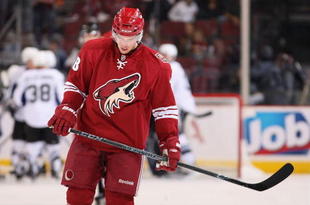 GLENDALE, AZ - NOVEMBER 16: Sami Lepisto #18 of the Phoenix Coyotes skates off the ice as the Tampa Bay Lightning celebrate winning the NHL game at Jobing.com Arena on November 16, 2009 in Glendale, Arizona. The Lightning defeated the Coyotes 4-1. (Photo by Christian Petersen/Getty Images)