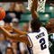 GREENSBORO, NC - MARCH 19:  Nolan Smith #2 of the Duke Blue Devils lays in a basket against Kyrie Sutton #33 of the Binghamton Bearcats during the first round of the NCAA Division I Men's Basketball Tournament at the Greensboro Coliseum on March 19, 2009 in Greensboro, North Carolina.  (Photo by Streeter Lecka/Getty Images)