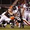 CLEVELAND - NOVEMBER 16: Ray Rice #27 of the Baltimore Ravens is tackled in the second quarter by Kaluka Maiava #56 and Jason Trusnik #93 of the Cleveland Browns at Cleveland Browns Stadium on November 16, 2009 in Cleveland, Ohio.  (Photo by Matt Sullivan/Getty Images)
