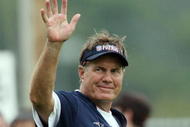FOXBORO, MA - JULY 31:  Head coach Bill Belichick of the New England Patriots waves to cheering fans after training camp on July 31, 2009 at Gillette Stadium in Foxboro, Massachusetts.  (Photo by Elsa/Getty Images)