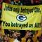 GREEN BAY, WI - NOVEMBER 01:  Fans hold a sign referring to quarterback Brett Favre #4 of the Minnesota Vikings during the game against the Green Bay Packers at Lambeau Field on November 1, 2009 in Green Bay, Wisconsin. (Photo by Scott Boehm/Getty Images)