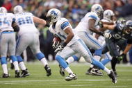 SEATTLE - NOVEMBER 08:  Aaron Brown #21 of the Detroit Lions carries the ball during the game against the Seattle Seahawks on November 8, 2009 at Qwest Field in Seattle, Washington. The Seahawks defeated the Lions 32-20. (Photo by Otto Greule Jr/Getty Images)