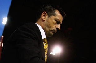 BURNLEY, ENGLAND - OCTOBER 31:  Phil Brown, manager of Hull City walks off after the Barclays Premier League match between Burnley and Hull City at Turf Moor on October 31, 2009 in Burnley, England.  (Photo by Matthew Lewis/Getty Images)
