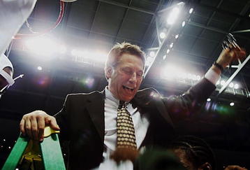 25 Mar 2000:  Head coach Tom Izzo of the Michigan State Spartans holds up a piece of the net as he steps down the ladder after defeating the Iowa State Cyclones 75-64 during the Midwest Regional Final of the NCAA tournament at the Palace in Auburn Hills, Mich.  The Spartans advance to the Final Four in Indianapolis.  <DIGITAL IMAGE> Mandatory Credit: Brian Bahr/ALLSPORT